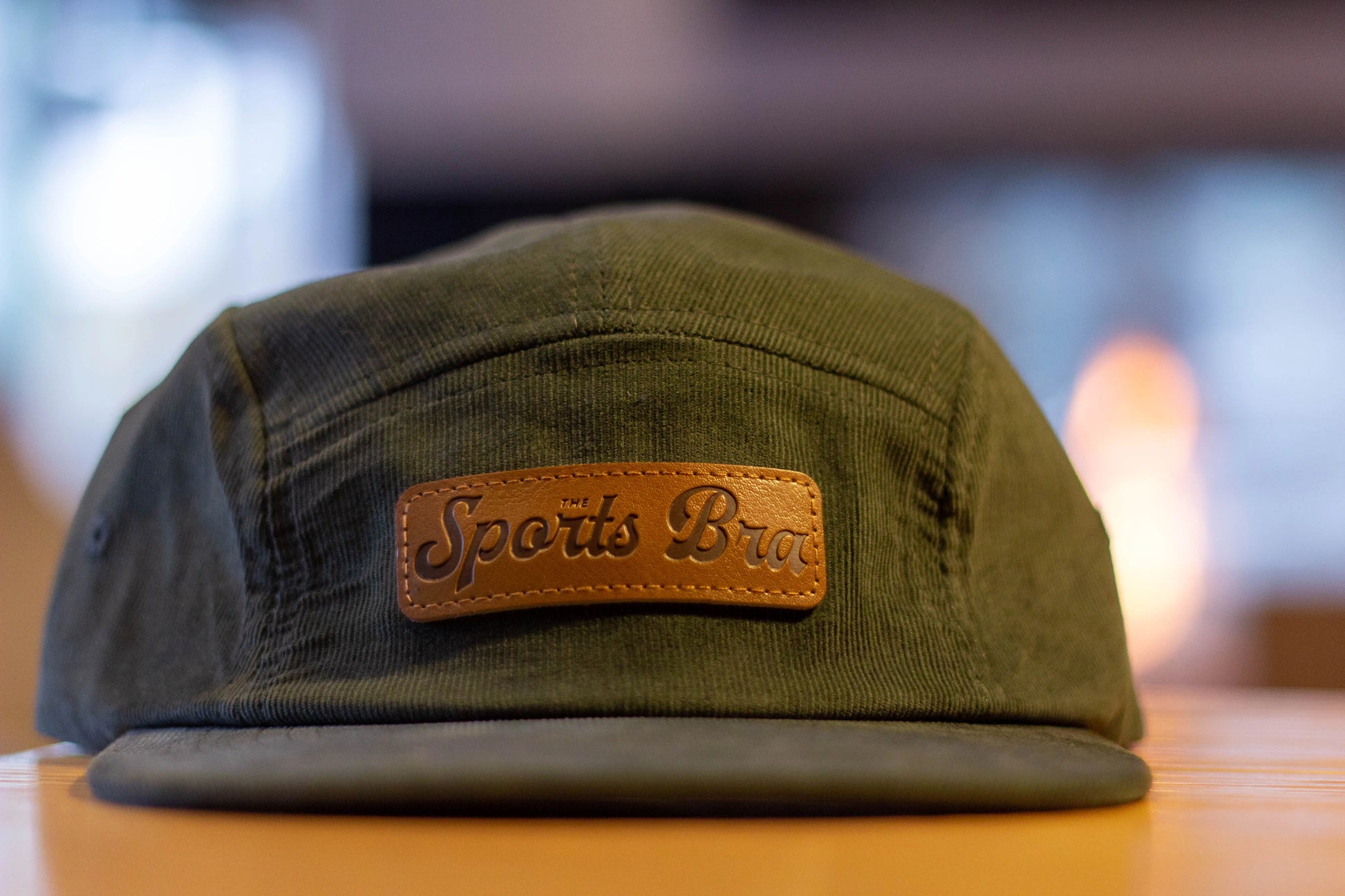 The Sports Bra Restaurant & Bar Evergreen 5-Panel Hat | Vegan Leather Crest on Lightweight Courderoy  Hats